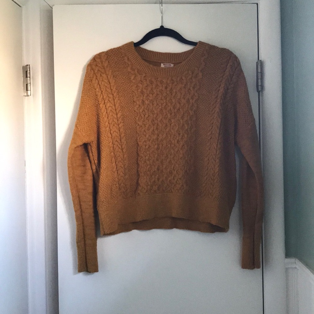 Mustard yellow cable-knit sweater